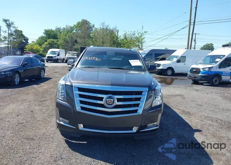 2015 Cadillac Escalade Luxury z USA, uszkodzony, nr VIN 1GYS4BKJ4FR196456